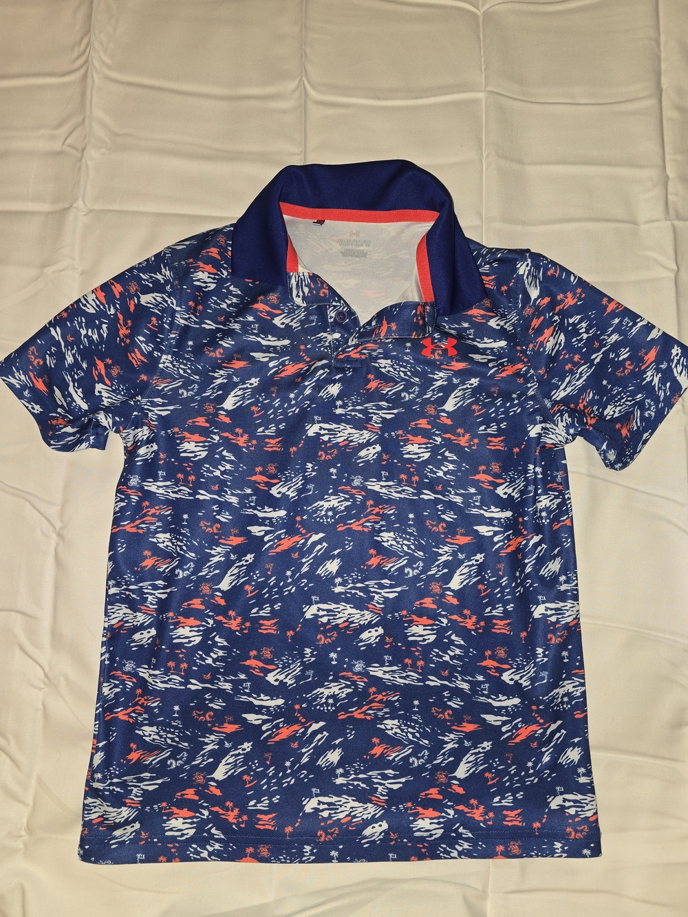 Under Armour Boys Blue Polo with Orange & White Print